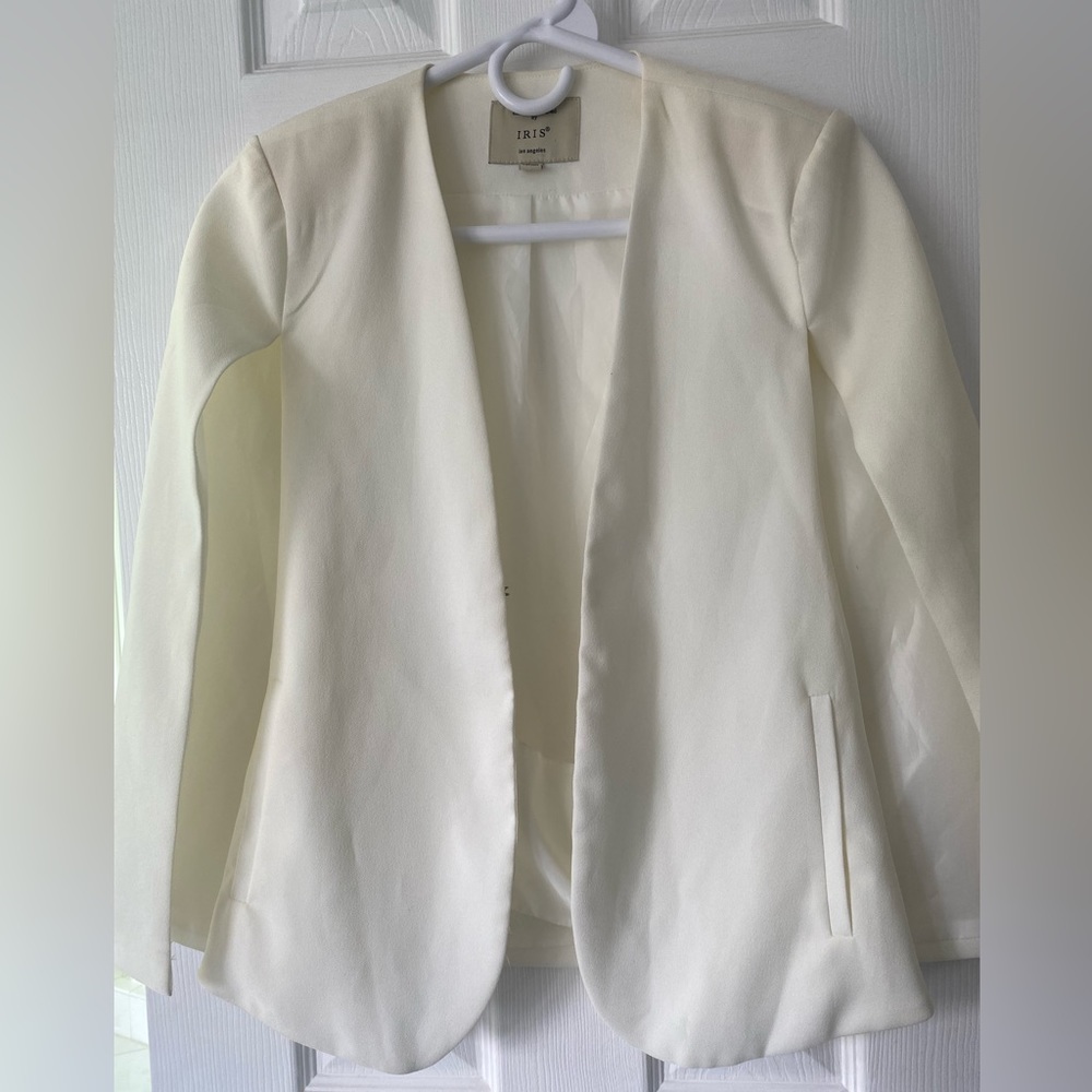 Stylish women's cream color blazer size S.